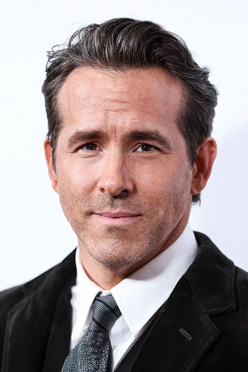Ryan Reynolds as Troy Kelly